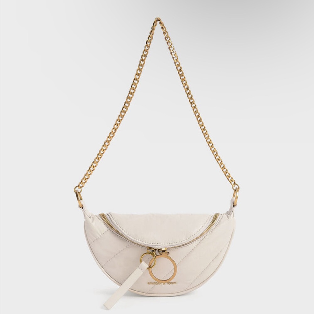 CHARLES AND KEITH Philomena Wrinkled Effect Half Moon Crossbody Bag Ivory purse
